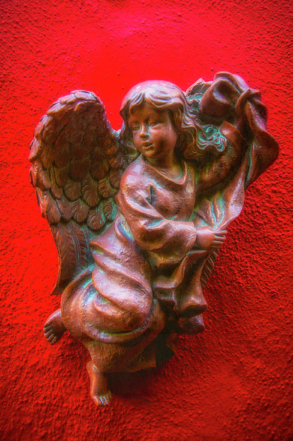 Running Angel On Red Wall Photograph by Garry Gay
