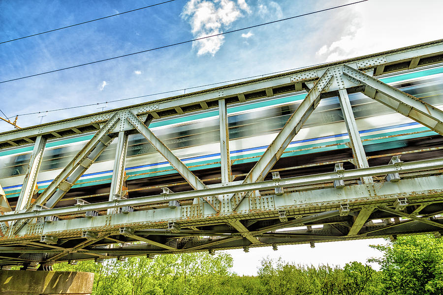 Running train on iron bridge Photograph by Vivida Photo PC