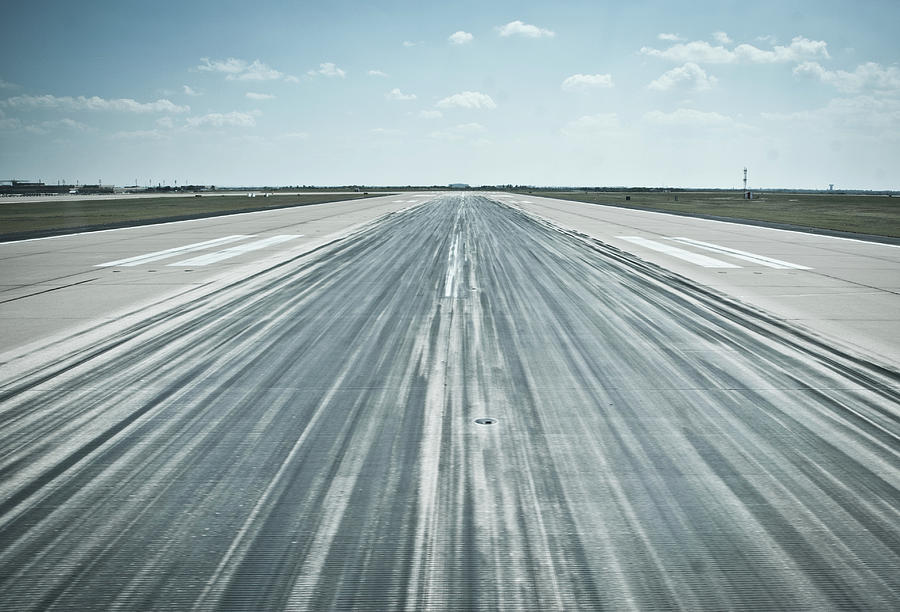 Runway At Airport Photograph by Laurent Chantegros