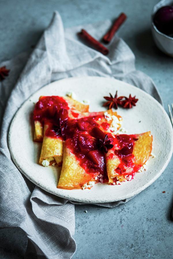 Russian Crepes With Cottage Cheese And Plum And Star Anise Compote Photograph by Alena Haurylik
