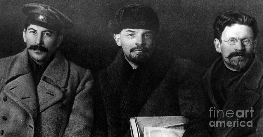 Russian revolutionaries leaders Josef Stalin, Vladimir Lenin and Mikhail Kalinin in 1919 Photograph by Russian School