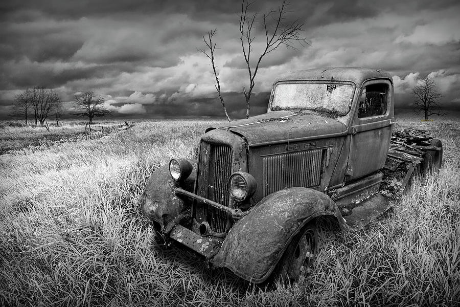 Rusted Truck in a Grassy Field Rural Landscape in Black and White Photograph by Randall Nyhof