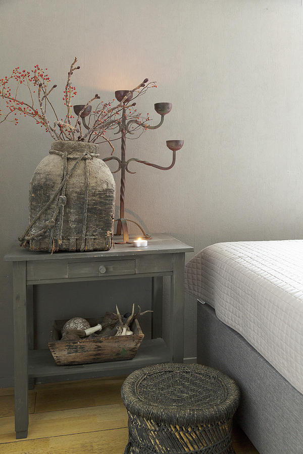 Rustic Accessories In Shades Of Grey On Small Table Next To Bed Photograph by Jansje Klazinga
