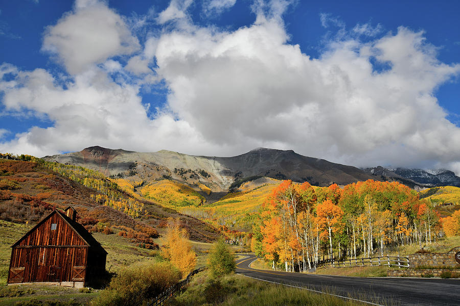 Rustic Barn Beneath Aspen Covered Mountains Photograph by Ray Mathis