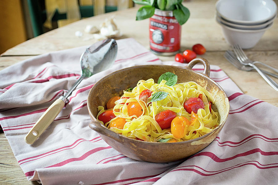 Rustic Bowl Of Tomato Pasta On A Kitchen Table Covered With Striped Red Linen Photograph by Kirstie Young