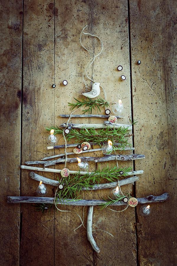Rustic Christmas Tree Made From Twigs On Wooden Wall Photograph by Eising Studio