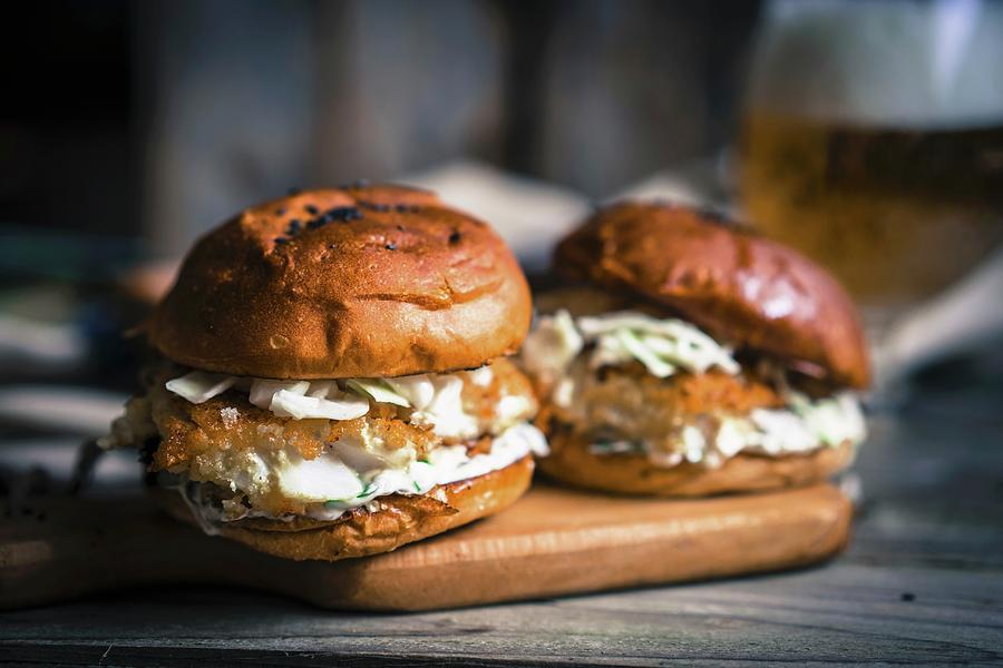 Rustic Fish Burgers With Coleslaw And Beer Photograph by Alena Haurylik