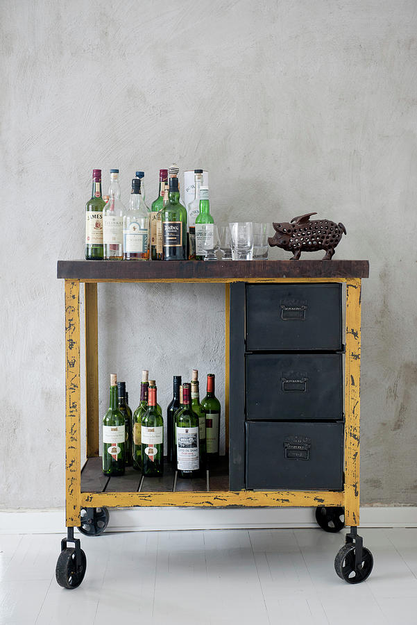 Rustic, Industrial-style Serving Trolley Used As Minibar Photograph by Magdalena Bjrnsdotter