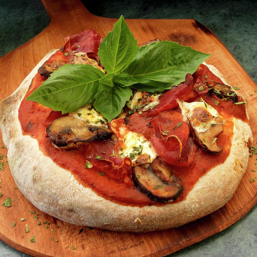 Rustic Pizza With Capicola, Mushrooms And Mozzarella And Basil Photograph by Paul Poplis Fine