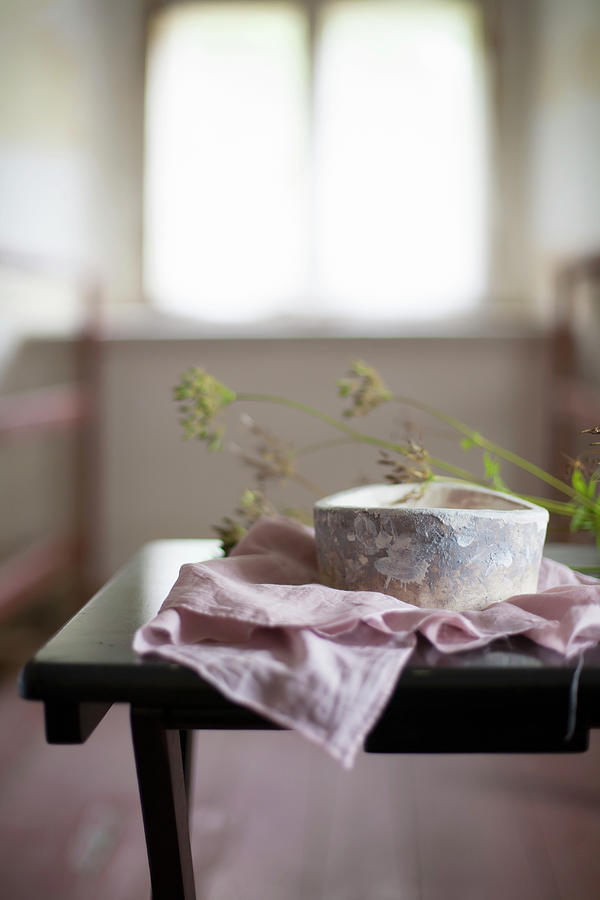 Flowers Still Life Photograph - Rustic Stoneware Bowl On Pink Cloth by Alicja Koll