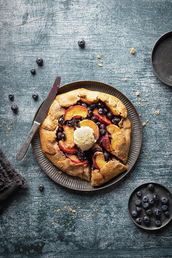 Rustic Tart gallette With Peaches And Blueberries, Served With Vanila Ice Cream Photograph by Zuzanna Ploch