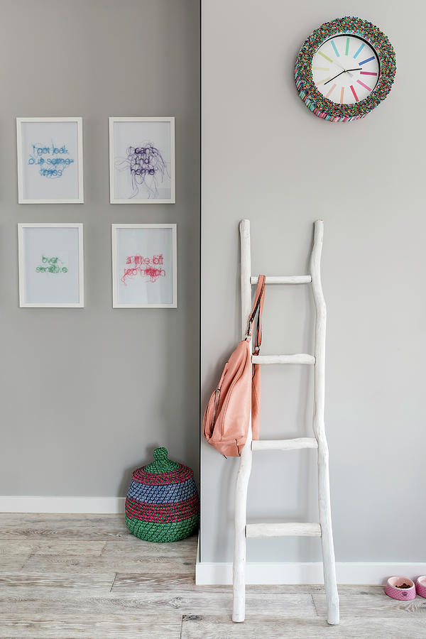 Rustic Wooden Ladder Used As Coat Stand In Grey Hallway Photograph by Lukasz Zandecki