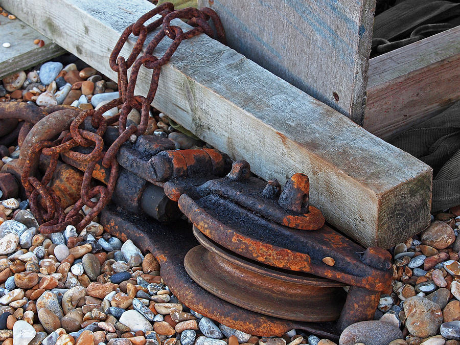 Rusty Boat Pulley On Dungeness Beach Photograph by Gill Billington