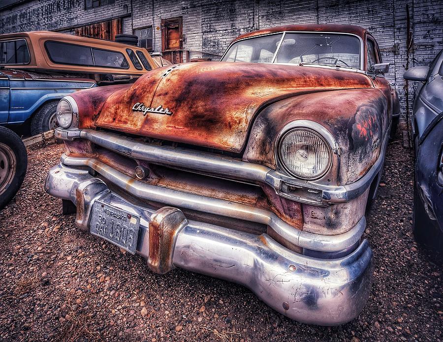 Rusty Boneyard Chrysler Photograph by Christopher Thomas