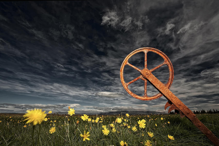 Rusty Wheel Photograph by orsteinn H. Ingibergsson