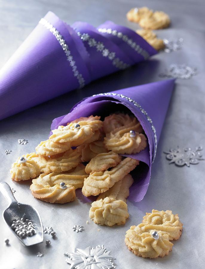 S-shaped, Pipped Vanilla Biscuits In Purple Cones Photograph by Jalag / Jan-peter Westermann