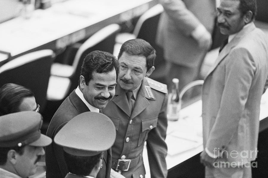 Saddam Hussein With Raul Castro Photograph by Bettmann