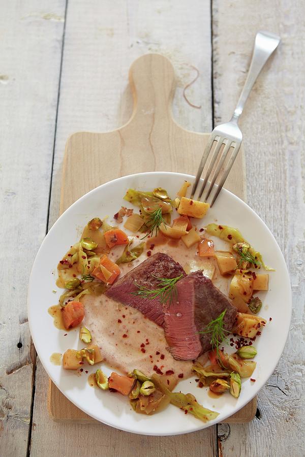 Saddle Of Lamb With Root Vegetables Photograph by Kirchherr, Jo