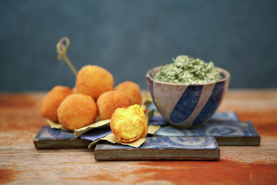 Saffron Croquettes With A Spinach And Ricotta Cream Photograph by Viola Cajo