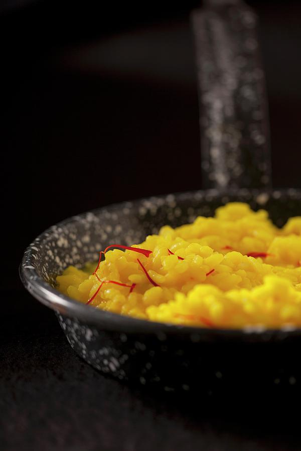 Saffron Rice In A Pan Photograph by Studio Lipov