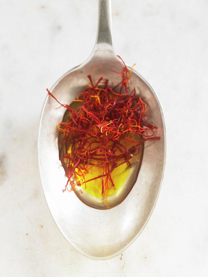 Saffron Threads In Oil On A Spoon Photograph by Nikolai Buroh