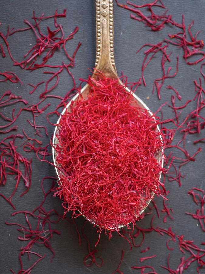 Saffron Threads On A Silver Spoon Photograph by Magdalena Paluchowska
