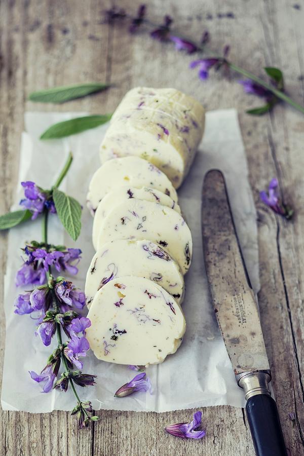 Sage Flower Butter On A Piece Of Paper With A Knife Photograph by Jan Wischnewski