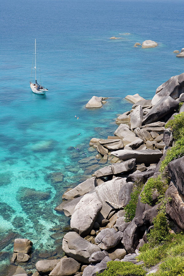 Sailboat And Snorkelers Near Granite Photograph by Holger Leue