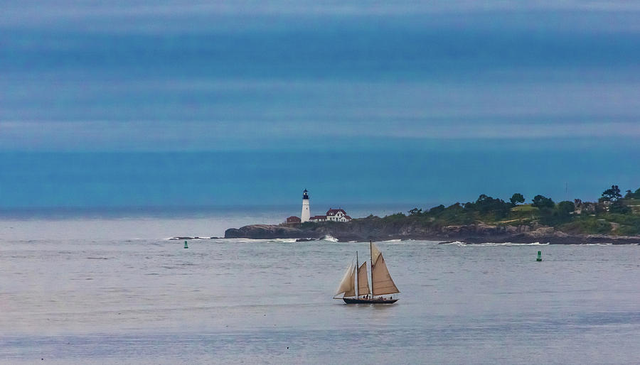 Sailboat At Lighthouse Photograph