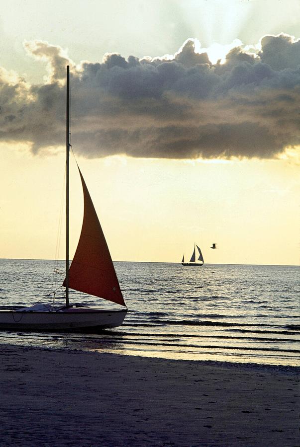 Sailboat At The Edge Of Deauvilles Photograph by Keystone-france