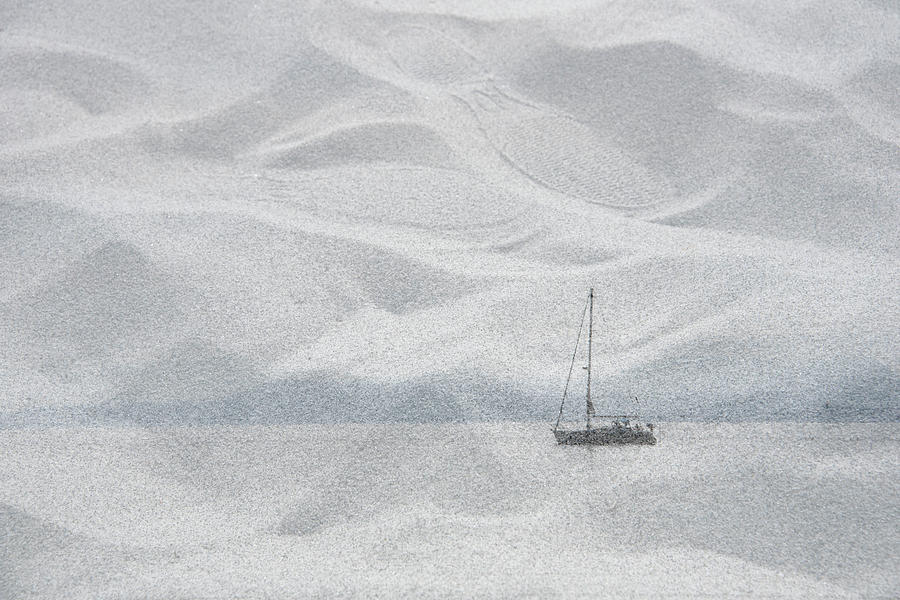Sailboat in the Sand Photograph by Kathy Paynter