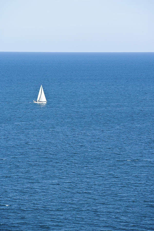 Sailboat On Ocean Photograph by Jupiterimages
