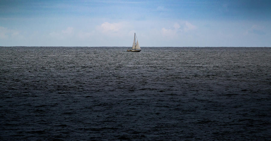 Sailboat on the ocean Photograph by Scott Lyons