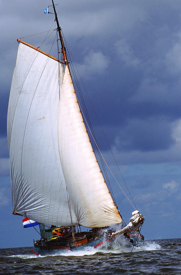 Sailing Boat At Sea Photograph by John Foxx