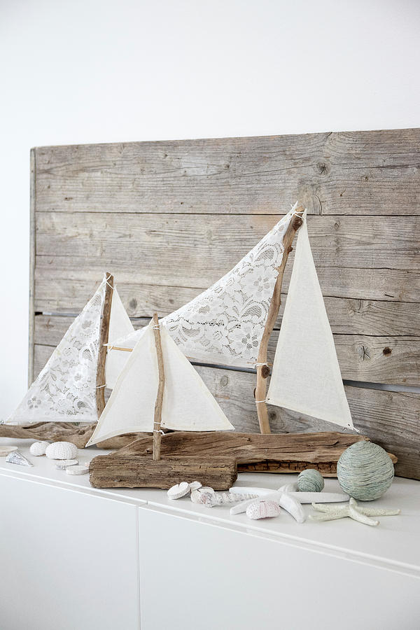 Sailing Boat Ornaments Made From Driftwood And Fabric Remnants Photograph by Astrid Algermissen