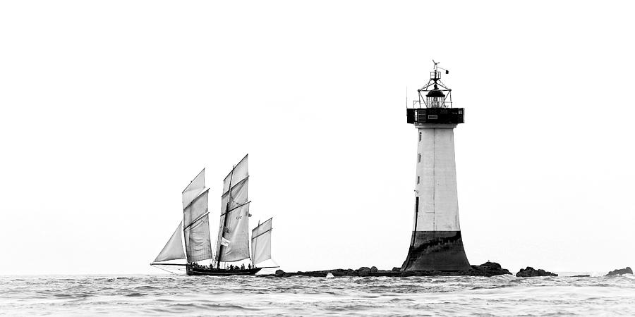 Sailing Near The Lighthouse Photograph by Vincent Demoulin