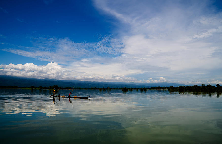 Sailing On The Reflection. Photograph by Md. Arifuzzaman