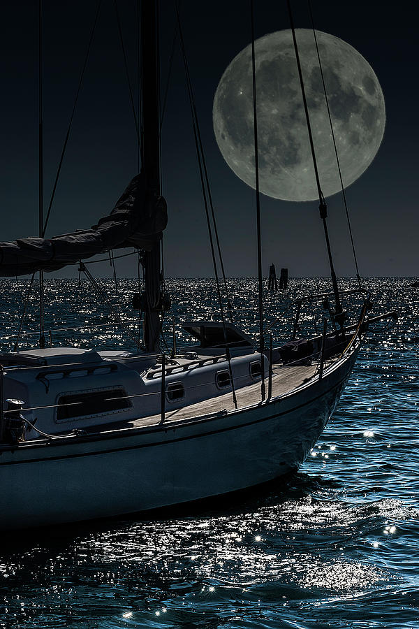 Sailing through the night Photograph by Wolfgang Stocker
