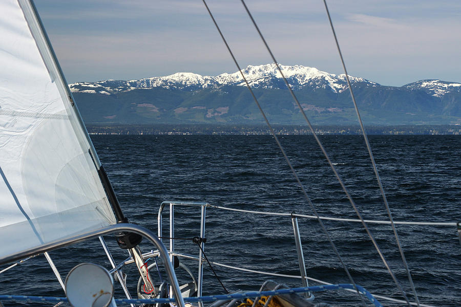 Sailing Upwind Towards Snow-capped Mountains by Pacific Northwest Sailing Sailing Upwind Towards Snow-capped Mountains by Pacific Northwest Sailing