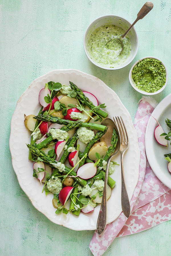 Salad From Baby Potatoes, Asparagus And Radishes With Pea Leaves Photograph by Zuzanna Ploch