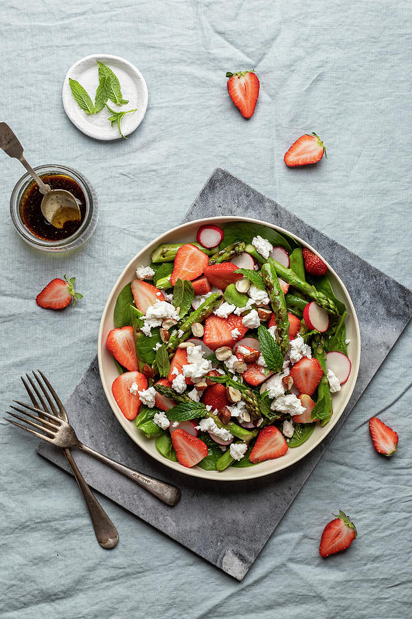 Salad Made Of Grilled Asparagus, Strawberries, Baby Spinach, Radishes, Fresh Mint, Feta Cheese And Hazelnuts Photograph by Zuzanna Ploch