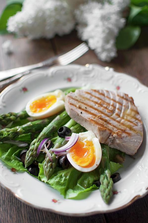 Salad Nicoise With Lettuce, Asparagus, Egg, Onions, Black Olives And Tuna Steak Photograph by Kachel Katarzyna
