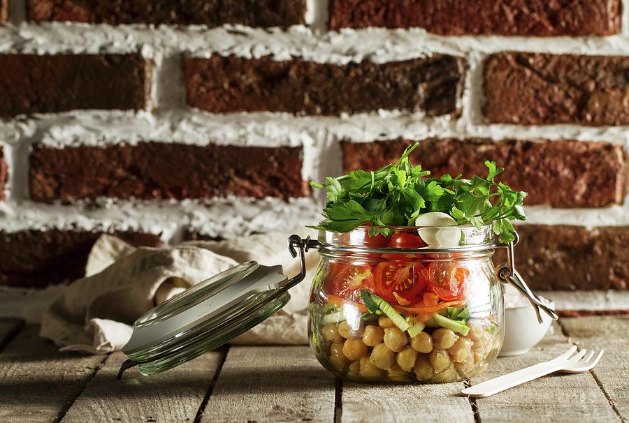Salad With Chickpeas, Tomatoes And Parsley In A Glass Jar Photograph by Valeria Aksakova
