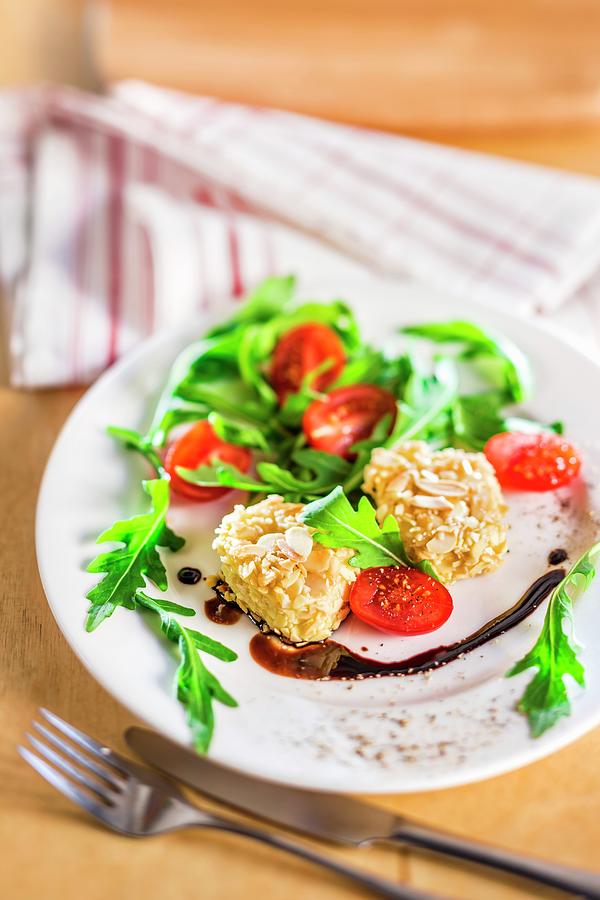 Salad With Goats Cheese In An Almond Crust, Rocket, Tomatoes And Balsamic Sauce Photograph by Lukasz Zandecki