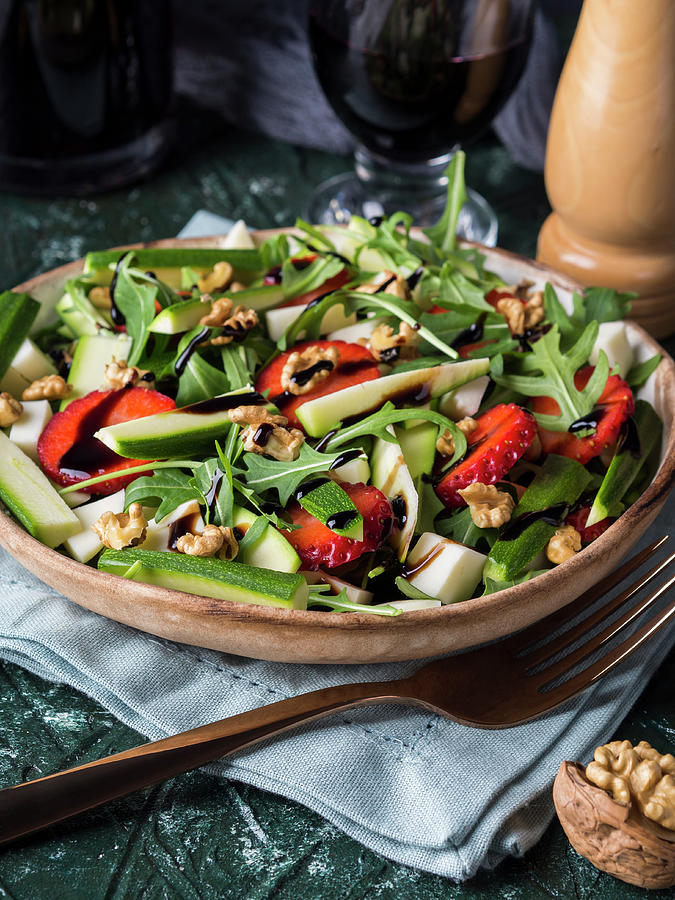 Salad With Raw Zucchini, Strawberries, Arugula, Diced Cheese, Walnuts And Balsamic Glaze Photograph by Sofya Bolotina