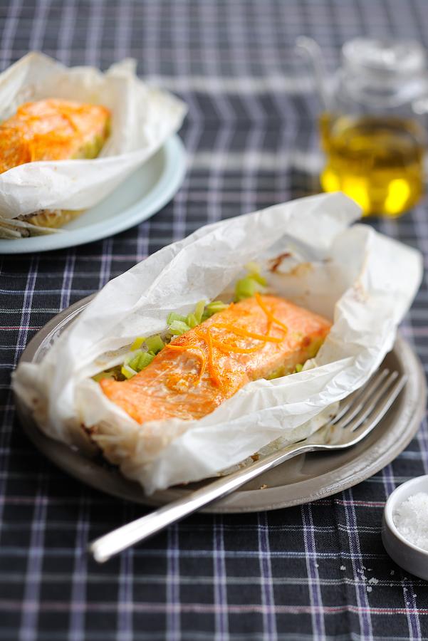 Salmon And Leeks With Orange Zests Cooked In Wax Paper Photograph by Carnet