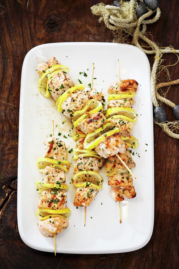 Salmon And Lemon Kebabs Photograph by Boguslaw Bialy