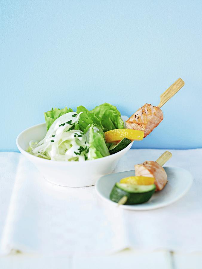 Salmon And Lemon Skewers With Courgette Photograph by Jalag / Janne