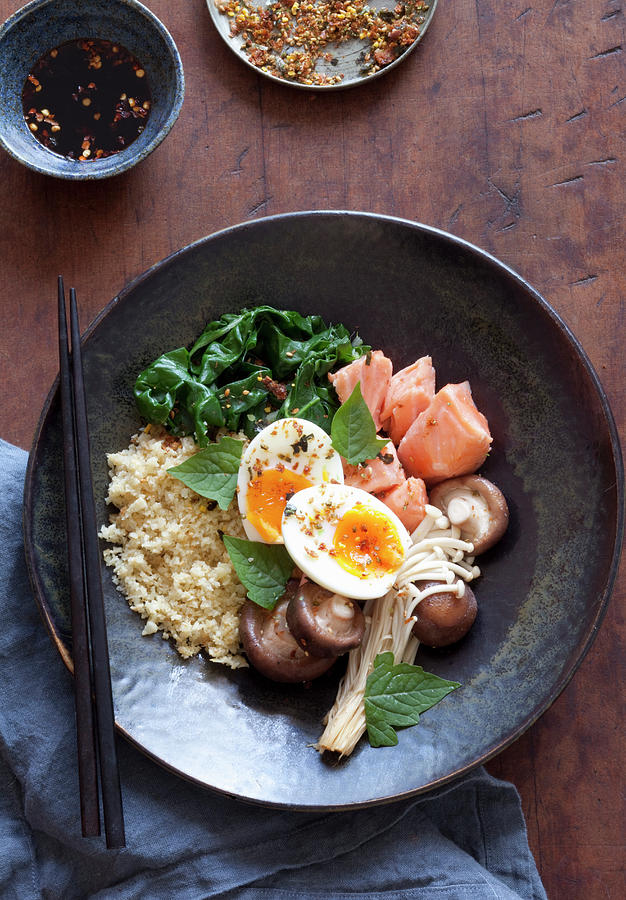 Salmon Bowl With Sooked Eggs Cauliflower Rice Photograph by Louise Hammond
