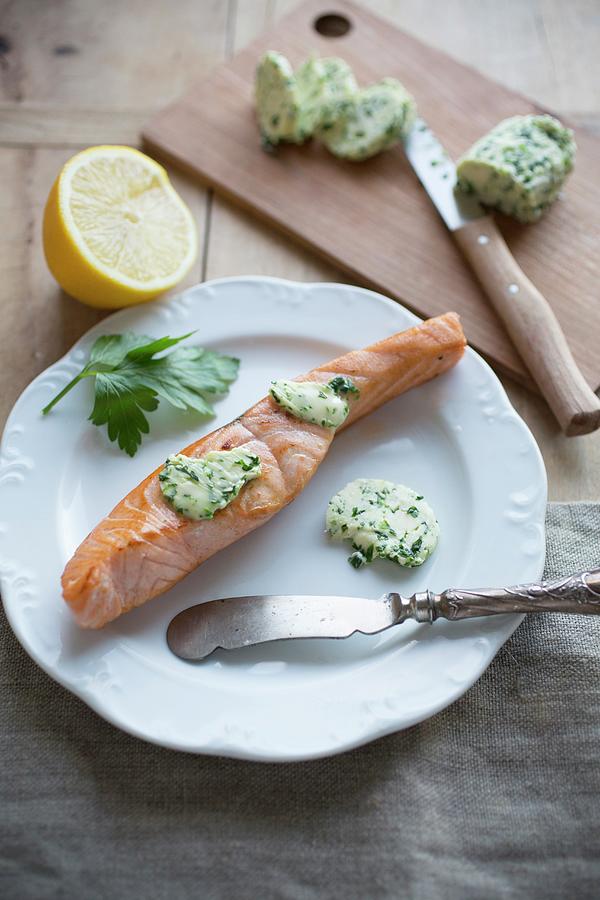 Salmon Fillet With Herb Butter Photograph by Claudia Timmann